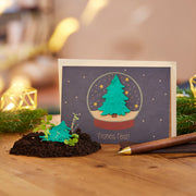 Christmas card with snow globe