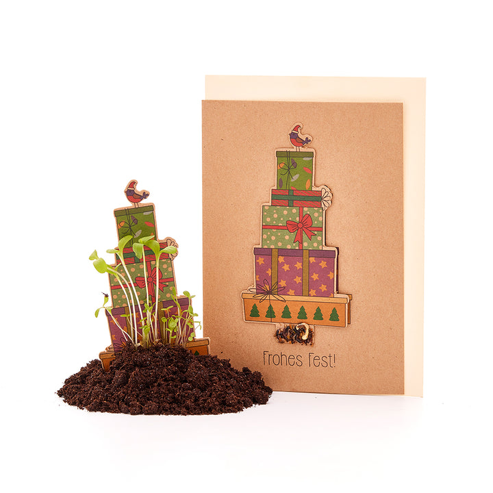 Weihnachtskarte mir Geschenken und Saatgut zum Einpflanzen