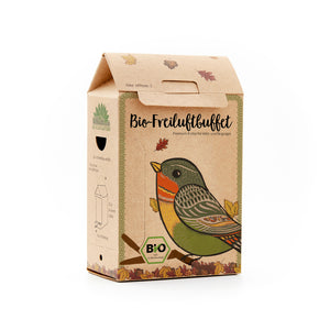 Kartonverpackung mit bunter Vogelzeichnung und der Aufschrift "Bio-Freiluftbuffet", Premium-Futter für Wild- und Singvögel.