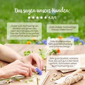 Person legt bunte Blumen in eine Holzpresse auf einem Holztisch im Freien; darüber Kundenbewertungen auf Deutsch und eine Bewertung von 4,8/5 Sternen.