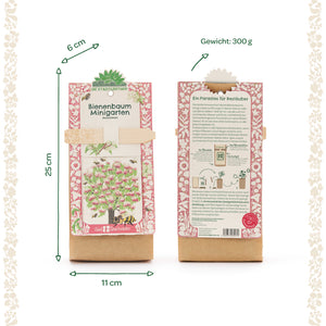 Zwei Verpackungen des Bienenbaum Minigarten Anzuchtsets, mit Maßen und Gewichtsbeschriftungen auf Deutsch sowie illustriertem Baum und Bienenmotiv auf der Vorderseite.