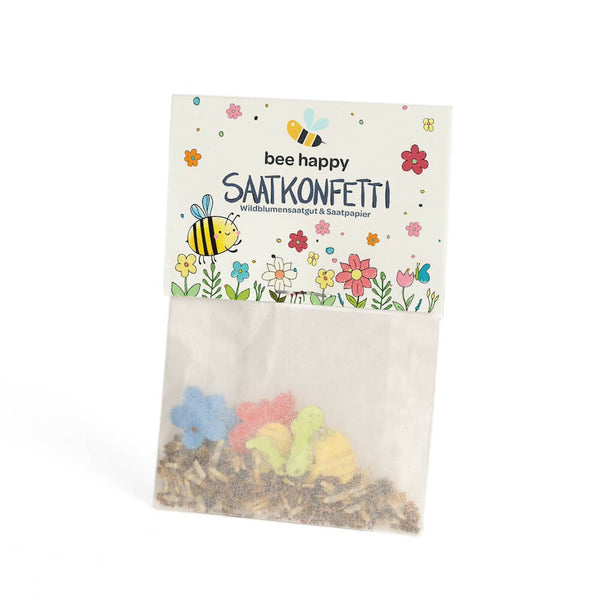 Wildblumen-Saatgut und Saatpapier-Konfetti im Pergamintütchen