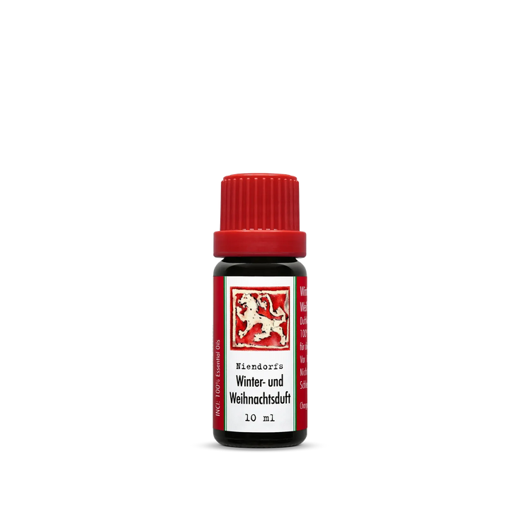 Braune Glasflasche mit rotem Deckel und Etikett "Wiendorfs Winter- und Weihnachtsduft, 10 ml".