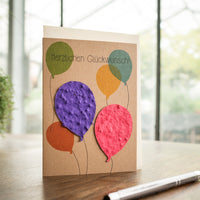 Wenskaart met kleurrijke ballonnen