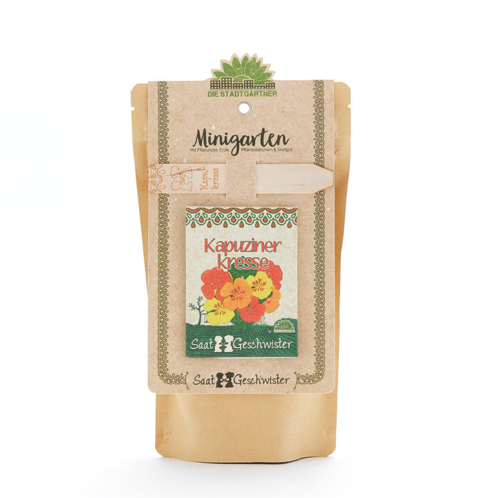 Braune Verpackung für einen Minigarten mit Kapuzinerkresse-Samen der Marke "Saft & Geschwister".